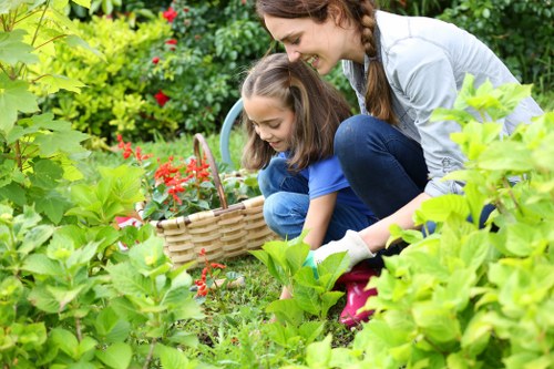 Well-kept garden maintenance in Lea Bridge with tidy lawn and borders